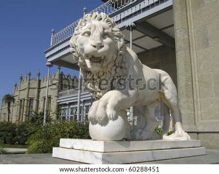 Stone sculpture of lion near Vorontsovskiy palace in town Alupka in region Crimea on Black sea, build for earl Vorontsov in 1830-1848 years.