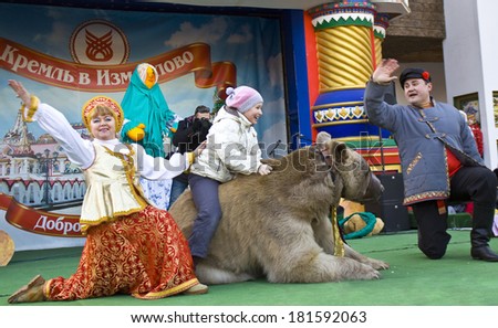 MOSCOW - MARCH 1 2014: maslenitsa (pancake week, shrovetide) - carnival of farewell winter and meeting spring in Moscow, artists on open street stage in Izmaylovskiy Kremlin.