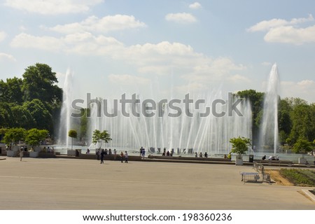 MOSCOW - MAY 23, 2014: moscovites and city visitors rest in Gorky park in summer. Park located in centre of the city has been founded in 1928, named by famous Russian writer Maxim Gorky in 1932.