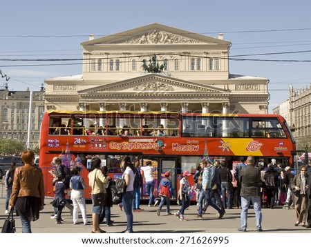 MOSCOW - MAY 09, 2014: excursion touristic bus stands near Big (Bolshoy) opera and ballet theatre, has been built in 1776.