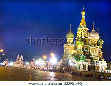Moscow, St. Basils Intercession cathedral and building of GUM (State Universal Department Store) on Red square at night.