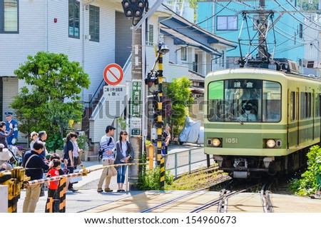 TOKYO- MAY 5 :A Japanese  train crossing junction. Train is the best way to ttravel in Japan May 5 ,2013 in TOKYO , Japan