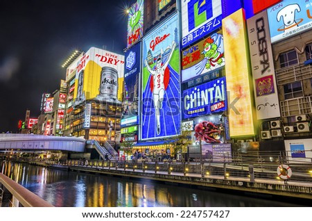 OSAKA,JAPAN - 18 April,2014 :Dotonbori canal is a popular nightlife and entertainment area characterized by its eccentric atmosphere and large illuminated signboards.