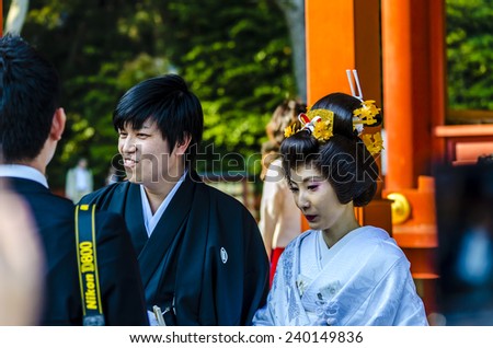 KAMAKURA, JAPAN - 24 April, 2014: In Tsurugaoka Hachimangu, wedding ceremonies are performed at the Maiden (Lower Worship Hall) or at Wakamiya shrine