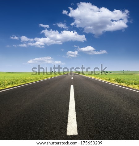 Driving on an empty road at lovely sunny day
