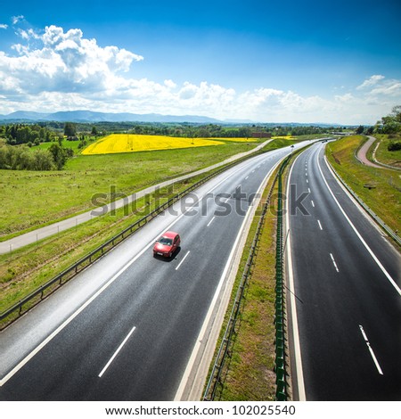 Two line, wide road with curve, highway