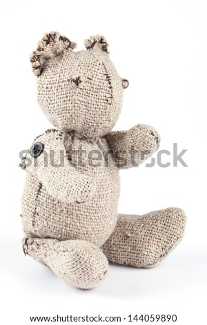Handmade toy, bear on a white background