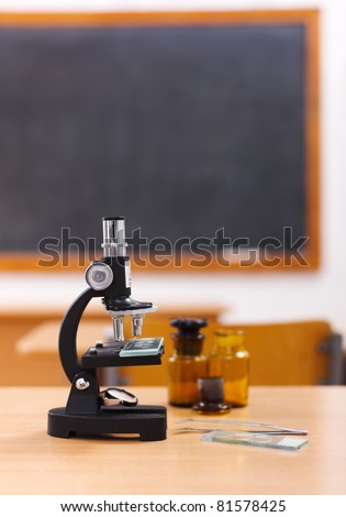 Microscope and sample bottles in class room