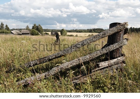 Old broken wooden village fence