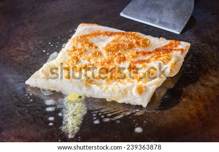 Fried pancake with coconut