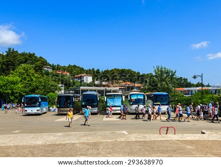 OLIMPIA, GREECE - JUNE 10: The buses transporting many tourists to visit The ancient Olympia on June 10, 2015 in Olympia, Greece. Many tourists visiting the birth place of Olympic games every year.