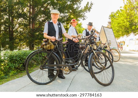 BLED, SLOVENIA- JULY 18: Old vintage bicycles by locals at lake Bled, Slovenia on July 18, 2015.The Bled days festival. Tourists visit concerts and see art crafts and production along the promenade.