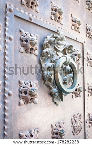 old metal door knocker on metal doors, Barri Gotic, Barcelona, Spain