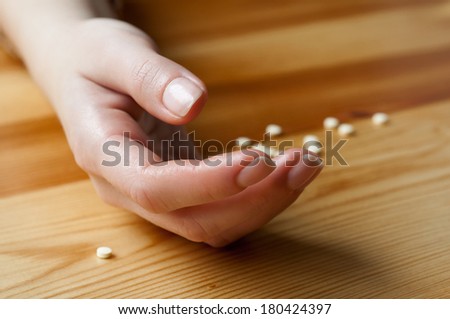 Pills spilled out of suicide hand
