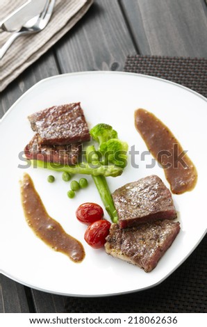 Barbecue Grilled Beef Steak Meat with Vegetables. Healthy Food. Barbeque Steak Dinner
