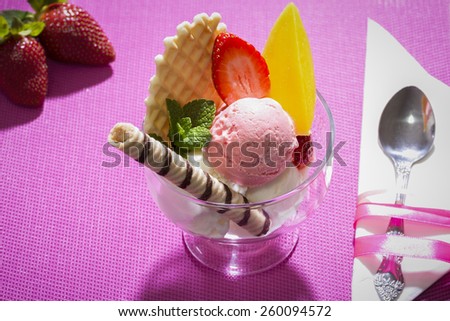 Strawberry ice cream dessert in a glass cup