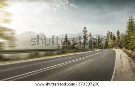 Mountain road at hight speed drive downhill