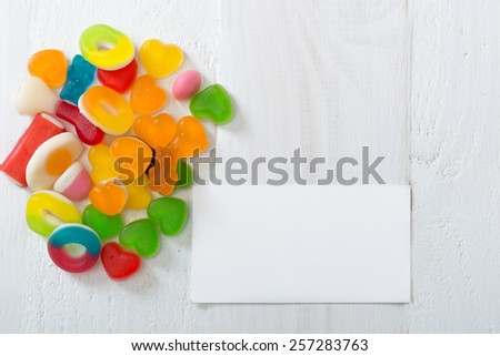 A lot of candies with  blank  card