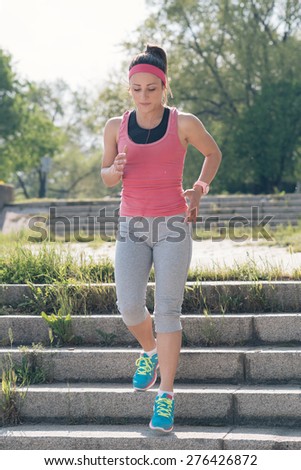 Woman Running Down the Stairs.Photo is carefully post processed to mach old Kodak film look.