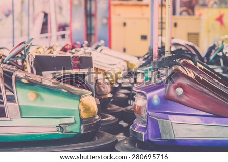 Bumper cars in the amusement park...Photo is carefully post processed to mach old film look.