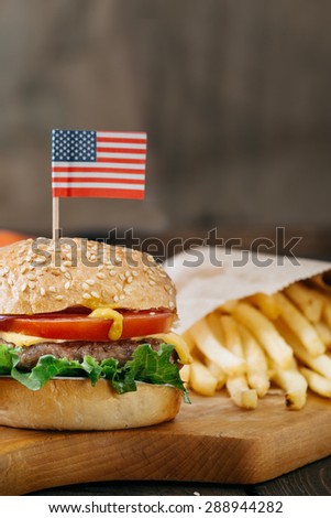American beef burgers with cheese.Selective focus  and small depth of field. Close up shoot.