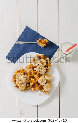 Homemade waffles whit fruits on vintage table. Selective focus and small depth of field.