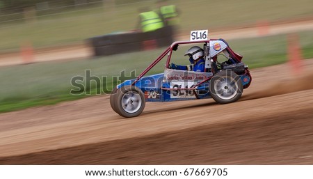 CALTHWAITE OVAL, UK - JULY 18: Jason Wood in his buggy racing at the Calthwaite Autograss Oval in Cumbria, UK on 18th July 2010.