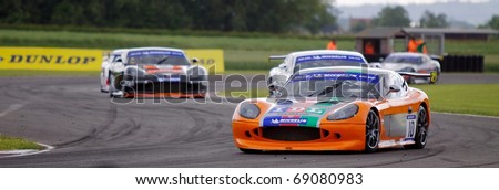 CROFT, UK - JUNE 19: Tom Sharp leads through the complex in round 12 of the Ginetta G50 Cup on June 19, 2010 at Croft, North Yorkshire, UK