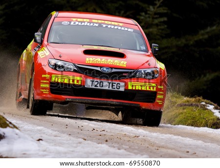 GREYSTOKE, UK - MARCH 6: Keith Cronin competes in the Malcolm Wilson Rally on 6th March 2010 on the Greystoke Forest Stages, Cumbria, UK.