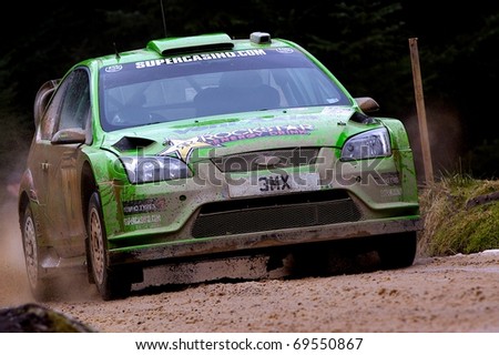 GREYSTOKE, UK - MARCH 6: Paul Bird competes in the Malcolm Wilson Rally on 6th March 2010 on the Greystoke Forest Stages, Cumbria, UK.