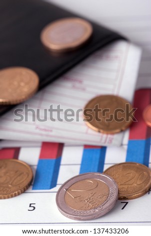 Wallet with invoice and euro coins