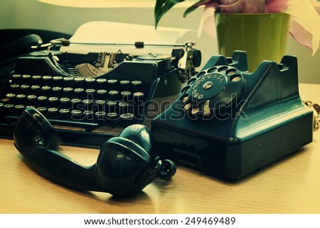 Vintage phone and old typewriter - vintage photo effect