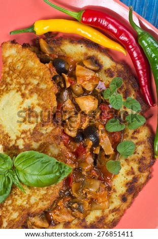 Hungarian style potato pancake filled with stew