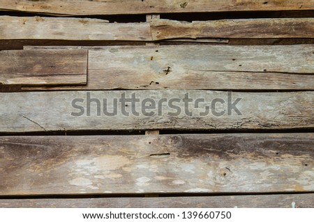 close up of old wood, piling up - background