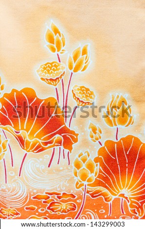lotus pattern paint on a batik design on shirt textile from Thailand