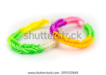 rubber bands with colorful fashion bracelet on white background