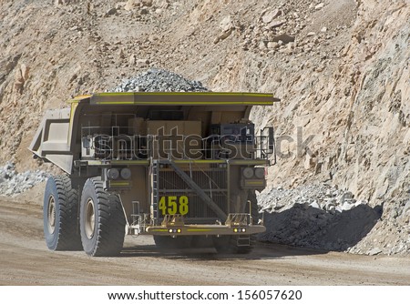 Chuquicamata, Chile - August 25: Haul Truck Carries Waste Rock In The Chuquicamata Copper Mine On August 25, 2013. Chuquicamata Is One Of The Biggest And Deepest Open Pit Copper Mine.