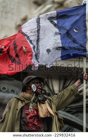Paris, France - November 8, 2014: People dressed as a zombie parades on a street during a zombie walk in Paris.