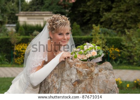 The beautiful  green eyes  bride with a bouquet