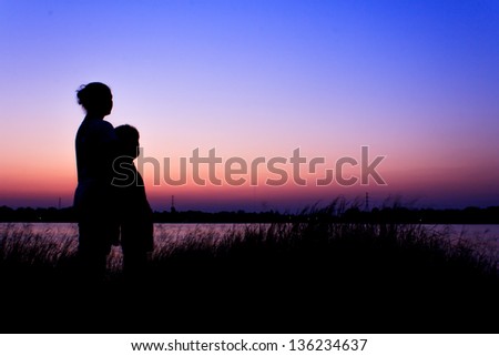 silhouette mother and child