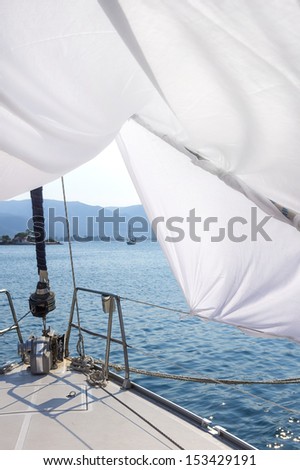 Sheet for shade on the bow of a sailing yacht