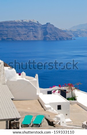 Classical greek architecture with caldera background in Firostefani - Santorini island