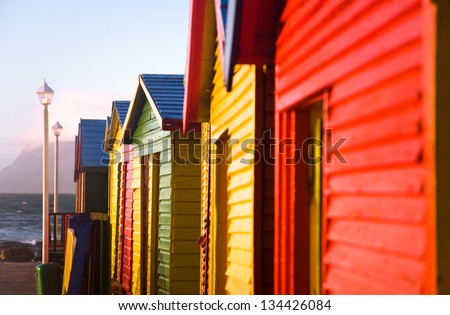 Colorful bathing boxes on St James Beach, Cape Town, South Africa.