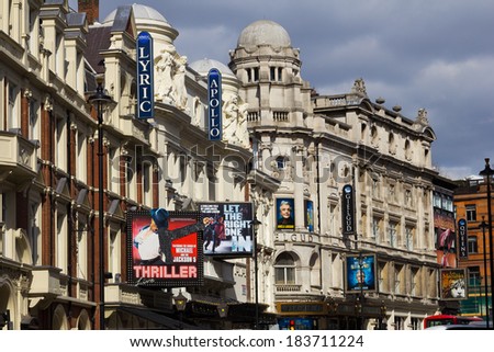 LONDON, UK - 24TH MARCH 2014: Part of Shaftsbury Avenue showing some of the Theatres such as Lyric Theatre, Apollo Theatre, Queens and Gielgud and posters to some of their plays