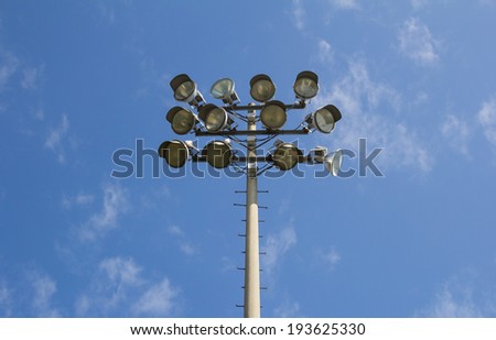 Low angle view of flood lights during the day