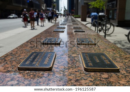 TORONTO, CANADA - JUNE 1, 2014: The 100 Workers Monument in Toronto. The plaques have the names of some people in Ontario who died in the workplace between 1901 and 2000