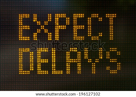 A sign informing motorists to expect delays