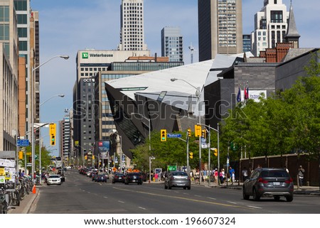 TORONTO, CANADA - MAY 31, 2014: Part of Bloor Street during the day showing part of the Royal Ontario Museum and surrounding buildings