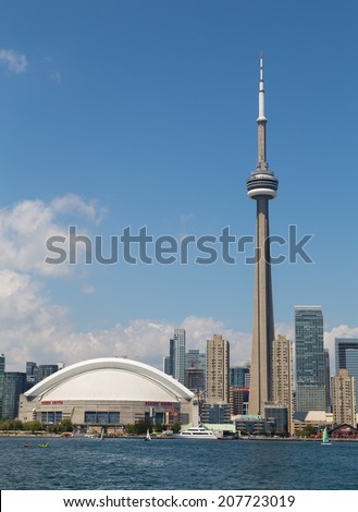 TORONTO, CANADA - 27TH JULY 2014: The CN Tower and Rogers Centre from Lake Ontario during the day