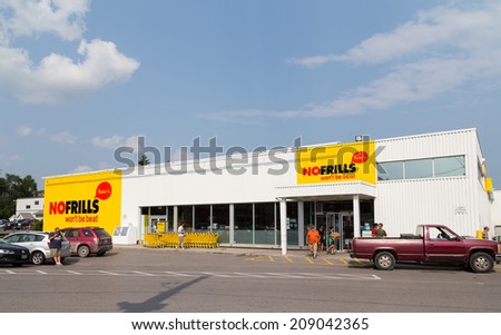 CAMPBELLFORD, CANADA - 2ND AUGUST 2014: The outside of a No Frills Store during the day. People can be seen outside the store